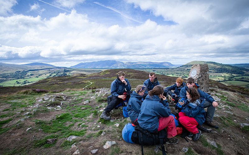 800x500 group eating on top of hill